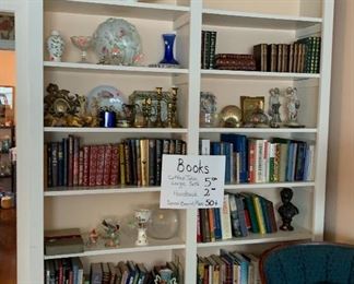Coffee table books, hardback novels, vases and decorative ware