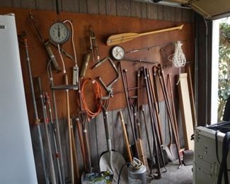 Garden tools, pipe clamps, scale, shovels