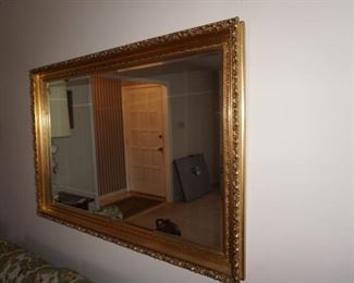 Large beveled edge mirror,  in the living room  4.5' x 3' $200
