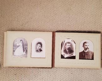 Antique photo album (poor condition) with antique photos