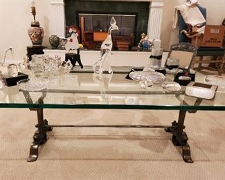 Beautiful industrial wrought metal base coffee table with thick glass top