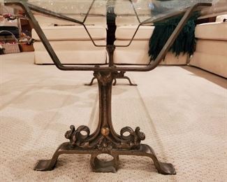 Beautiful industrial wrought metal base coffee table with thick glass top