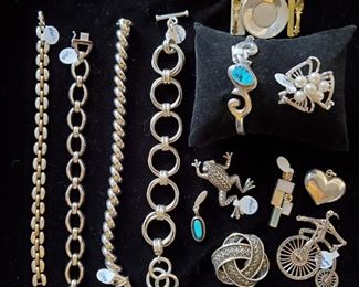 Sterling bracelets, pendants and brooches