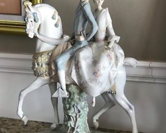 Large Lladro, Man & woman riding a horse,  $425