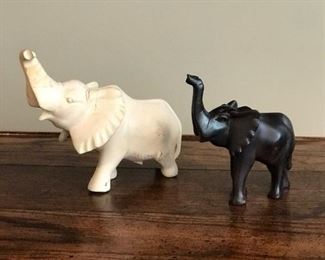 Dark wood carved elephant, 5" x 5.5"H,  $10;  White elephant, hand carved in Kenya,  8"L x 6.5"H, $15