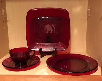 Red dinner ware.  6 square coffee mugs and saucers, was $7, NOW $3.50; 3 square bowls was $4, NOW $2; 6 round coffees mugs and saucers, was $7, NOW $3.50; 3 salad plates, was $5, NOW $2.50, 19 dessert plates was $1 each, NOW .50 each