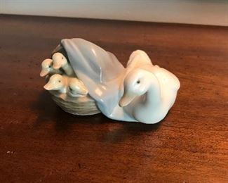 Lladro "Mother Duck and Ducklings in a Basket", 4"W x 2"H,  $30