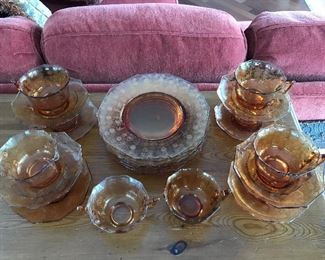 Depression glass (?), Sugar & creamer, 1 umbrella platter, 10 plates, 8 cups and saucers; $40