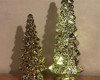 Pair of gold lighted Christmas trees, 9.5"H, was $10, NOW $6,  13"H, was $14. NOW $10.  Tree on the right is lighted,  