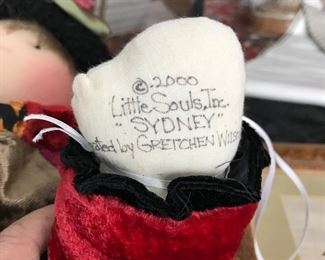 Signature on hand of the dolls