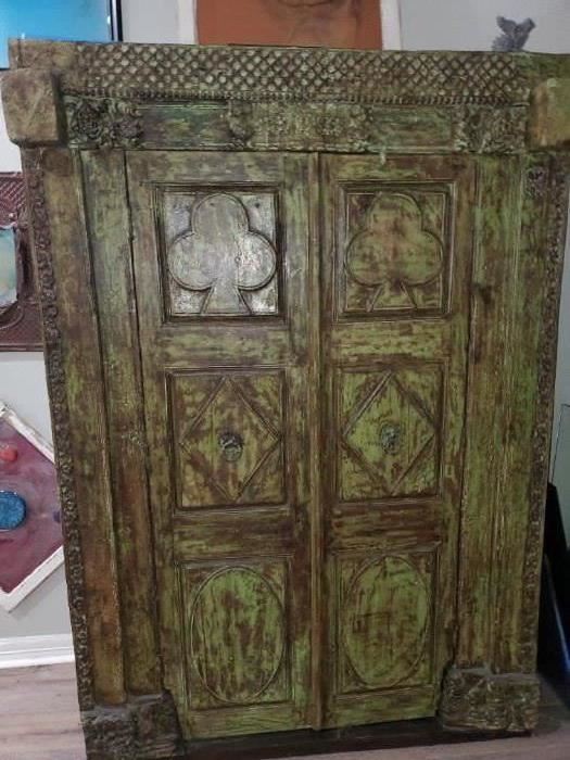 400 year old doorway turned into a teak cabinet.
