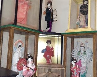 Beautiful Oriental dolls, we have several in cases