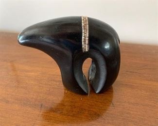 $225 Juan Tafoya 1979 (San Ildefonso 1949-2006) 4 1/2" x 3 3/4'' bear decorated with strands of heishi beads and turquoise eyes