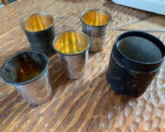 $145 Sterling and gilt travelling cups in leather case missing lid, 5.6 t oz