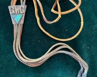 $75 Vintage Native American sterling and turquoise bolo on rawhide, initials GWG