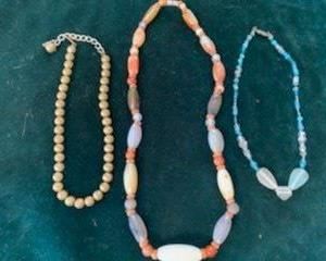 Left to Right, $5 *NOW $2* Gold Bead Necklace, $20 *NOW $10* Stone Necklace, $5 *NOW $2* Glass Bead Necklace