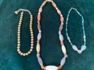 Left to Right, $5 Gold Bead Necklace, $20 Stone Necklace, $5 Glass Bead Necklace