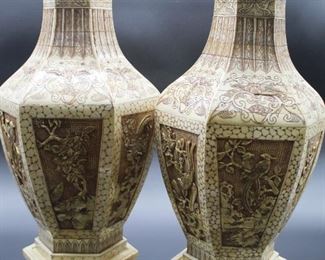 Pair bone craved and engraved vases on bases.