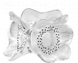 LALIQUE- 3 Anemones Candle holder. Feature an anemone delicate flower motif - the symbol of anticipation.
Designed by Marc Lalique, circa 1935
Signed in script: " Lalique, France"
Measure approximately 3 1/8" tall and 5" at widest.