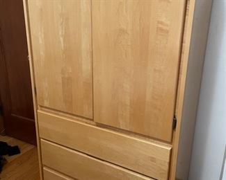 Pottery Barn dresser. 36"x17"x60". Three pull out drawers and the top two doors pull open. $125.