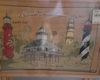 two tv tables new in the wrapper, showing three Florida lighthouses