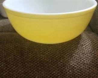 This yellow and white mixing bowl is from the 1950's and it is in like new condition