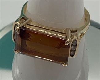 14 Karat Gold, Diamond, and Topaz Ring