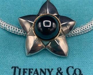 Tiffany and Co Large Silver Sterling and 18 Karat Gold Hematite Star Pendant
