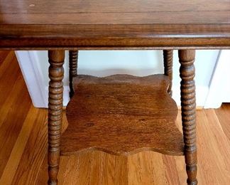 Antique Victorian oak lamp table with turned legs