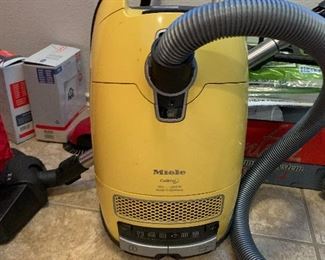 475 A Very rare offering and highly sought after Miele Callma cannister vacuum with accessories and extras 