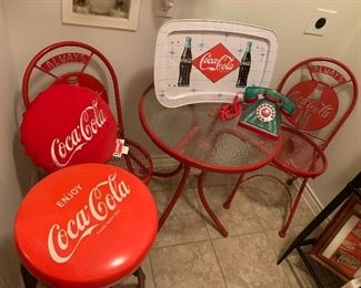 $298~ ALWAYS COCA COLA METAL TABLE WITH GLASS TOP AND TWO FOLDING CHAIRS $78 (TWO AVAILABLE) ~ COCA COLA BAR STOOLS $68~ COCA -COLA BOTTLE STYLE PHONE $24~ COCA COLA FOLDING TRAY