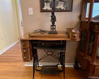 Treadle sewing machine with ram head drawer pulls