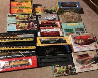 Some of the HUNDREDS of boxed train cars and accessories