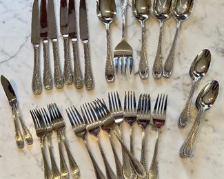 Item 97: Ralph Lauren Silverware: $45 6 knives, 9 dinner forks, 4 salad forks, 11 soup spoons, 2 slotted spoons, 2 serving spoons, 2 butter knives, 1 serving fork