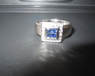 1 18 KT WHITE GOLD WITH 4 INVISIBLE SET GENUINE BLUE SAPPHIRES AND DIAMONDS