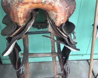 Old saddle with stand