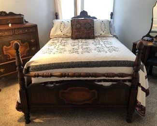 Beautiful four piece matching bedroom outfit. Bed, two dressers & cedar chest.