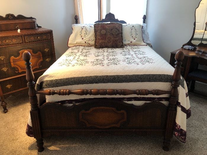 Beautiful four piece matching bedroom outfit. Bed, two dressers & cedar chest.