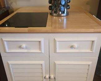 Spice rack is being sold with rolling cart. Spice rack measures 8" x 13". Rolling cart has a spice rack holder cabinet on the end. Doors open up to an area with three shelves and area with trash can. Two drawers for storage and comes with utensil caddy that stacks on another area for holding things. Has three hooks on other side to hold dish towels, bags etc. Cart measures 35" x 21" (with side down) 33" (with side up) .

https://ctbids.com/#!/description/share/752994