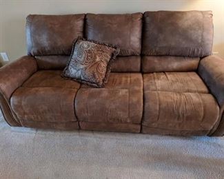 Microfiber sofa with electric recliners at each end. Measures 90" long and height at back is 39", height at seat is 18".

https://ctbids.com/#!/description/share/752986
