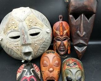 These masks were purchased at World Market by owners. They are beautifully hand carved and decorated in Africa. Round:10" diameter, 4" off wall Tall: 15.5"x6"3.5" Small Red/Black: 7"x3.5"x1" Small Tongue: 8"x3.5"x1" Small Brown: 7.5"x4"x1.5" Small Green: 8"x3.5"x1.5"

https://ctbids.com/#!/description/share/752919