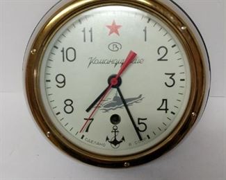 Vintage Soviet Union Kauahguyckue maritime submarine clock. These clocks were used on the walls of Soviet Naval ships and submarines. No key found.

9" diameter, 4" off wall https://ctbids.com/#!/description/share/753058