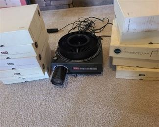 Ten carousel slide trays some with landscape photos. Projector does not seem to power on and previous owner does not know the problem.

https://ctbids.com/#!/description/share/752905