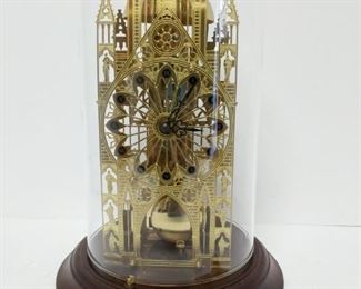 Beautiful Hermle skeleton clock manufactured in West Germany and dated 1984. Clock sits under a glass globe and includes crank key and working pendulum.

https://ctbids.com/#!/description/share/753057