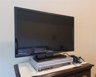 32” Funai LED television with 3 HDMI ports. It stands 20" tall on the stand. It does not have it’s own remote control, but does work. The Panasonic VHS and DVD player can also record. It comes with all needed cords, a remote and an instruction manual.

https://ctbids.com/#!/description/share/752881