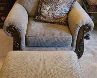 Beautiful Ashley Furniture Martinsburg chenille chair with matching ottoman. Chair has ornate design on front and legs and  measures 41" x 37" x 38". The ottoman measures 26" x 23" x 15".

https://ctbids.com/#!/description/share/752877