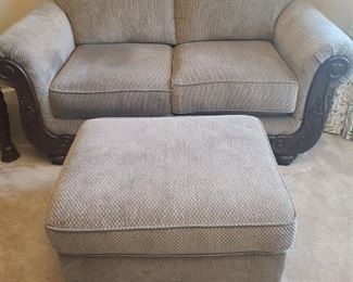 Ashley Furniture Martinsburg sofa in meadow color chenille fabric measures 63" x 39" x 38". Ottoman measures 29" x 24" x 17". 

https://ctbids.com/#!/description/share/752878