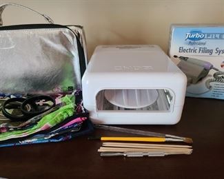 All you need to make your nails look gorgeous. Nail Filer is still in box though box has been opened the piece has never been used. CND UV light is used but does still work and is in good condition. Comes with carrying case to hold supplies. Extra things are metal spring bracelets to accent your wrist and show off those freshly pampered nails.

https://ctbids.com/#!/description/share/752868