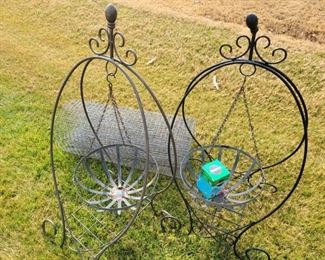 One pair of swinging flower baskets with metal stands, flower fencing wire and a box of Miracle Grow.

https://ctbids.com/#!/description/share/753024