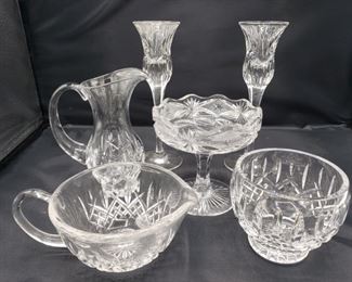 Includes candle holder pair (8"H x 2 1/2"L), sugar bowl (4"H x 4"L), dish (4 1/2"H x 5"L), creamer (2 1/2"H x 7"L) and milk dish (4 1/2"L x 6). All pieces are Waterford.

https://ctbids.com/#!/description/share/752839